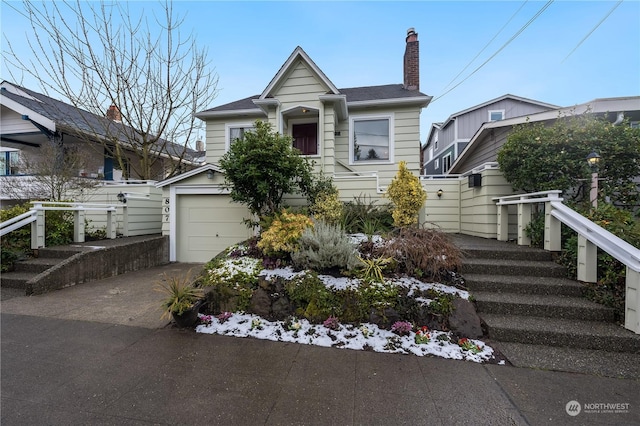 view of front of property featuring a garage