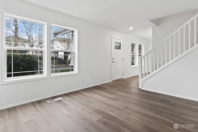 foyer with hardwood / wood-style flooring