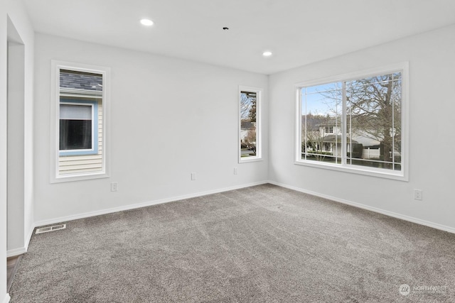 view of carpeted spare room