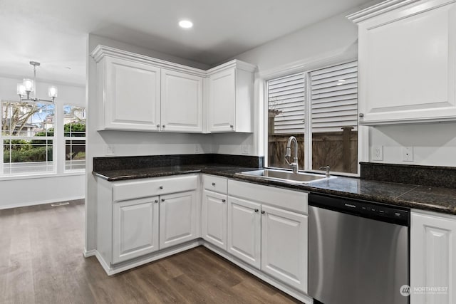 kitchen featuring white cabinetry, dishwasher, sink, and dark hardwood / wood-style flooring