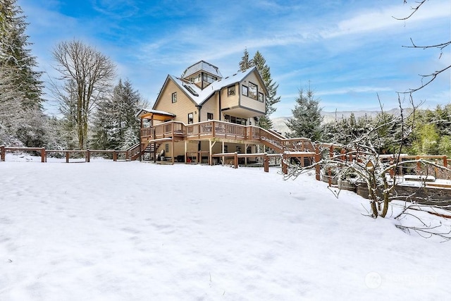 view of front of house featuring a wooden deck