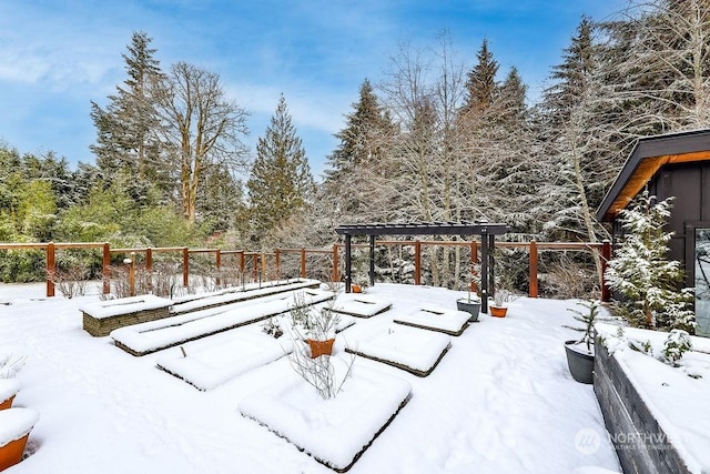 view of snow covered deck