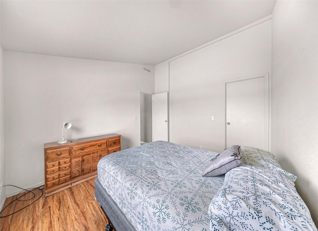 bedroom featuring hardwood / wood-style flooring