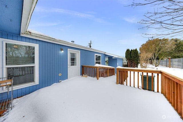 view of snow covered deck