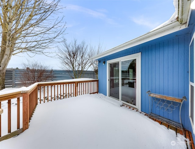 view of snow covered deck