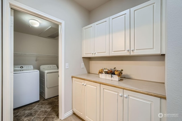 washroom featuring washer and dryer