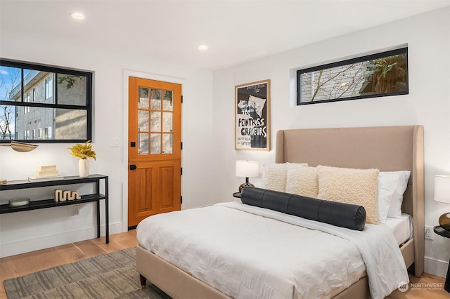 bedroom with light wood-type flooring