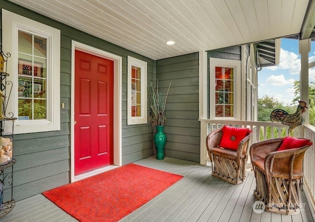 doorway to property featuring a porch