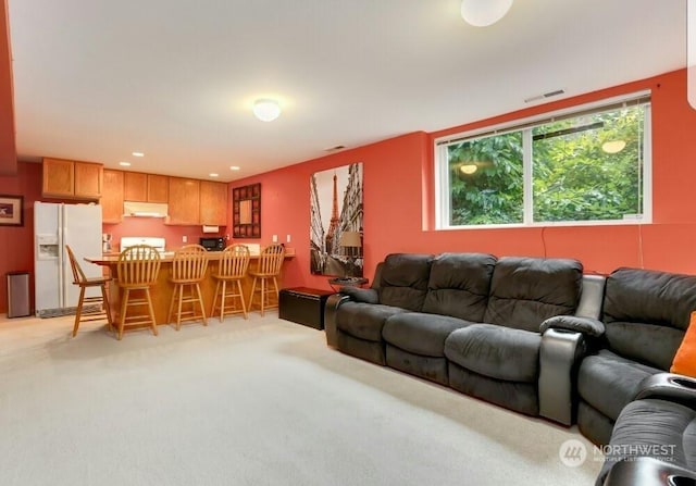 living room with light carpet