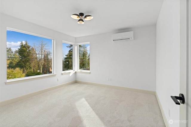 unfurnished room with light carpet and a wall mounted air conditioner