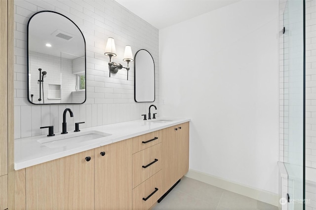 bathroom featuring vanity and tile patterned flooring