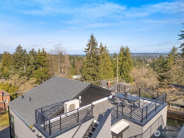 aerial view with a wooded view