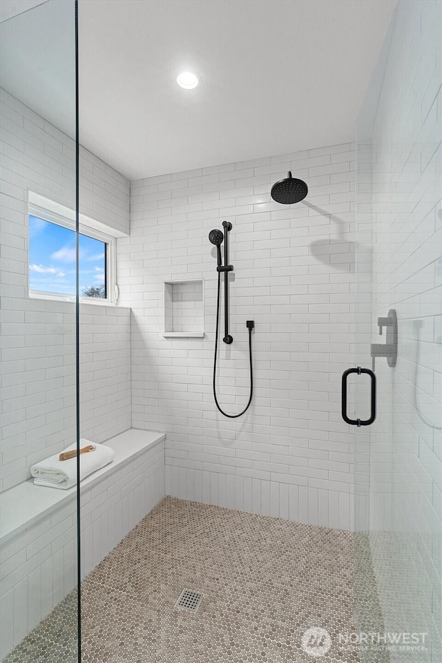 full bathroom featuring a stall shower