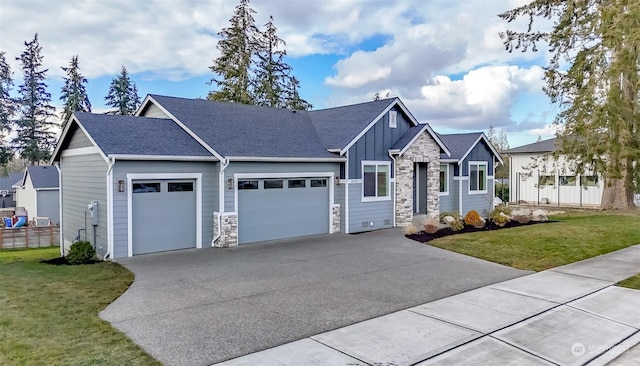 craftsman-style house featuring a garage and a front lawn