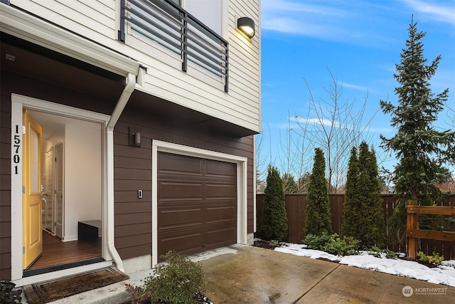 garage featuring fence