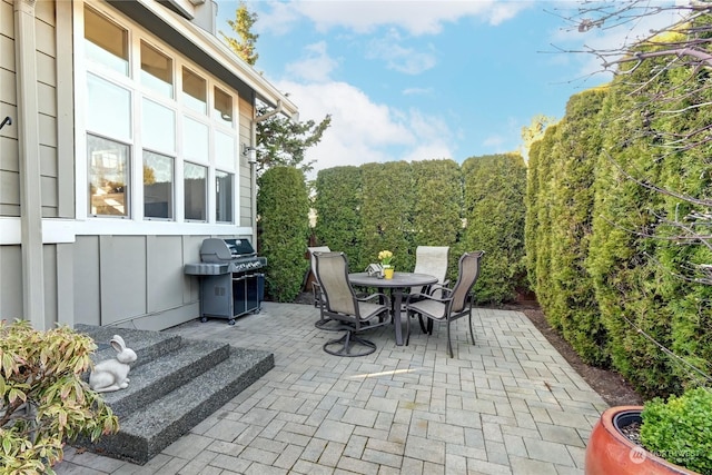 view of patio with a grill