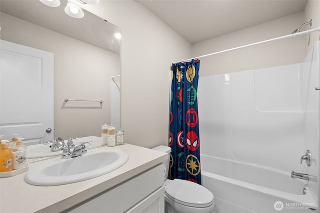 bathroom with vanity, toilet, and shower / bath combination with curtain