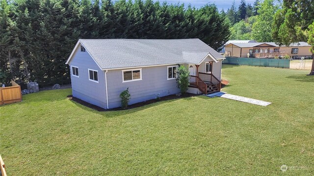 exterior space featuring a front yard