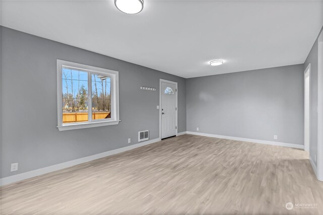 entrance foyer featuring light hardwood / wood-style floors