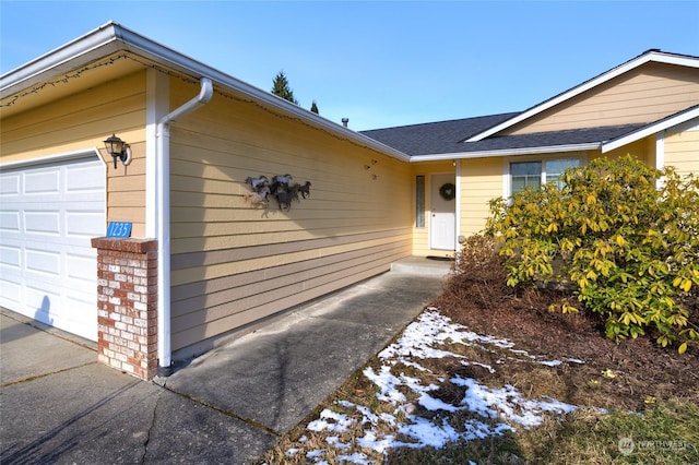 entrance to property with a garage