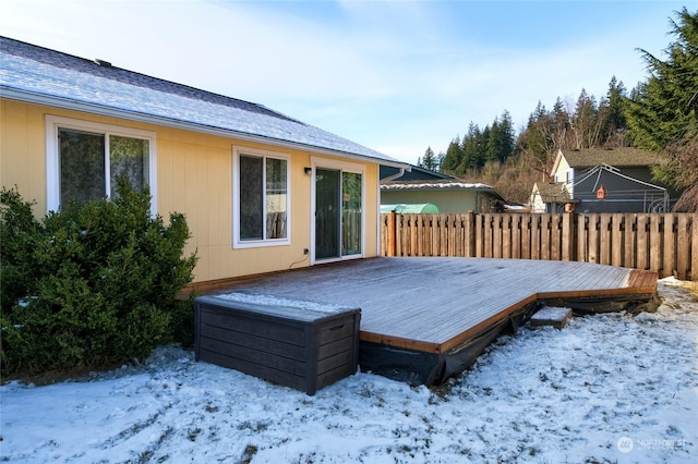 view of snow covered deck