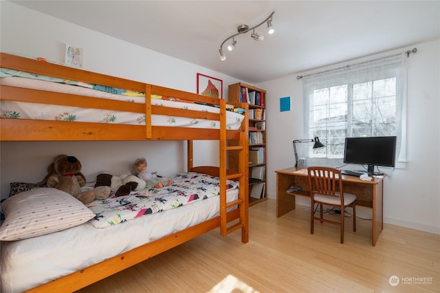 bedroom featuring light hardwood / wood-style flooring