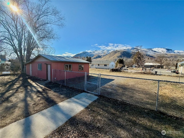 exterior space featuring a mountain view