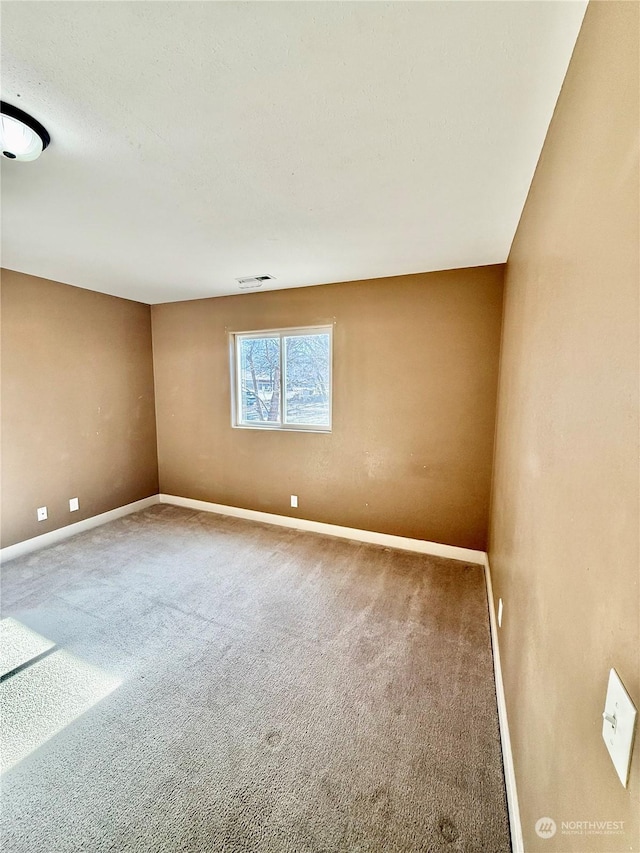 view of carpeted spare room