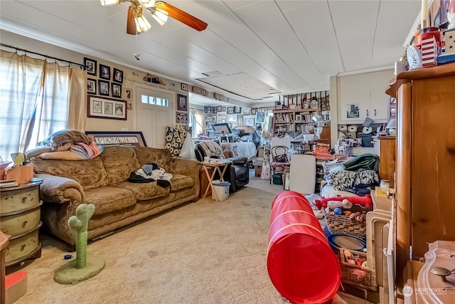 living room with ceiling fan and light colored carpet