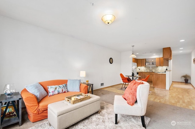 living room with light hardwood / wood-style floors