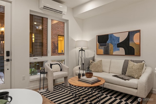 living room with hardwood / wood-style flooring and a wall mounted AC