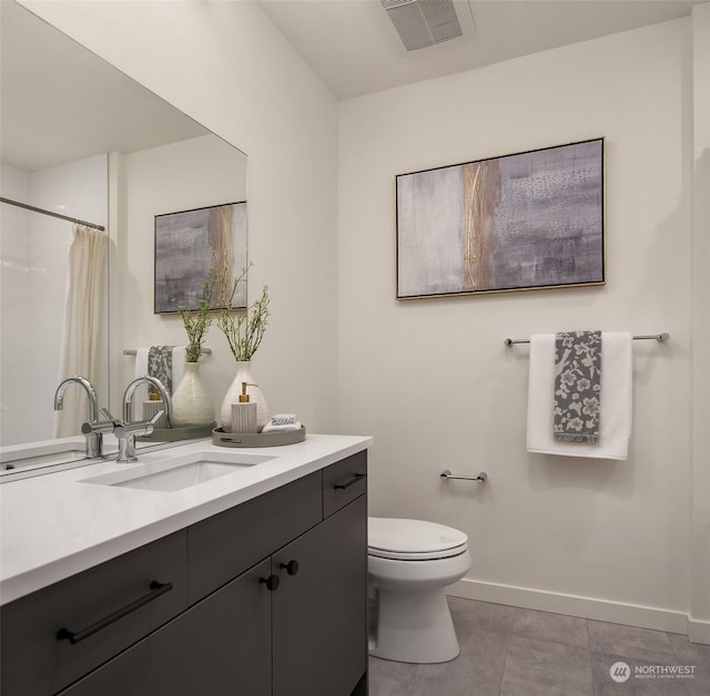 bathroom with vanity, tile patterned flooring, toilet, and a shower with shower curtain