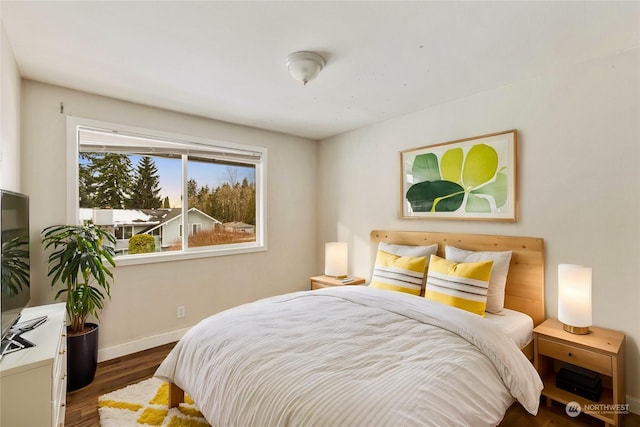 bedroom featuring dark wood-type flooring