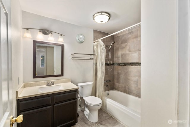 full bathroom with tile patterned flooring, shower / bath combo, vanity, and toilet