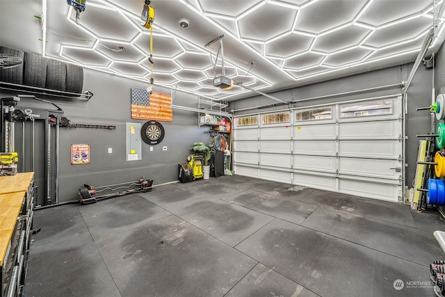 garage featuring a garage door opener