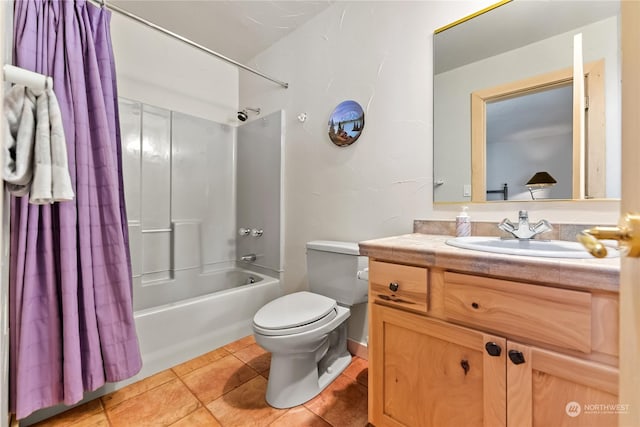 full bathroom featuring vanity, tile patterned floors, shower / bath combo with shower curtain, and toilet