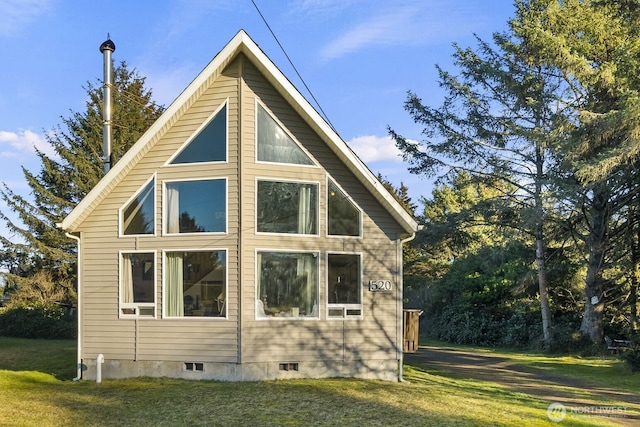 520 Inlet Ave NW, Ocean Shores, WA 98569 - view of side of property with a lawn