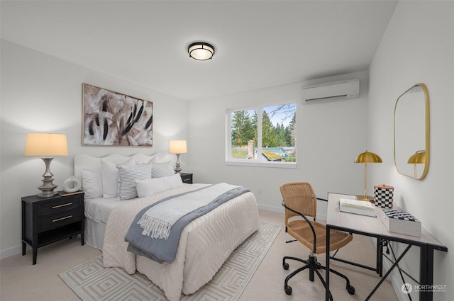 bedroom with an AC wall unit and light colored carpet