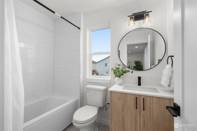 full bathroom featuring vanity, toilet, and shower / tub combo with curtain