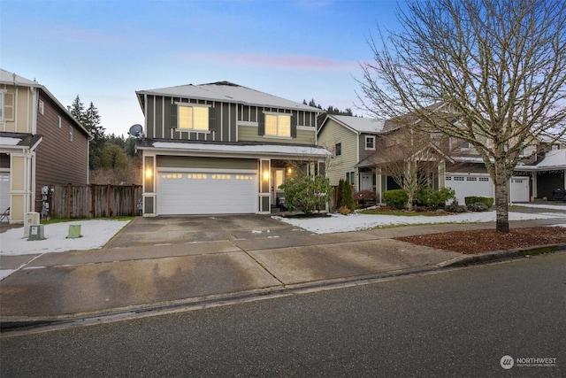 front of property with a garage