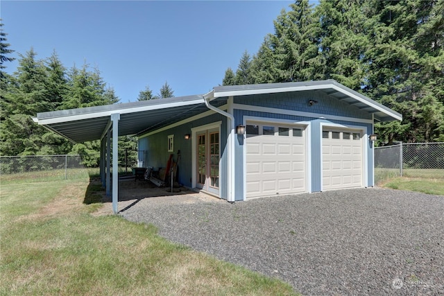 garage featuring a carport