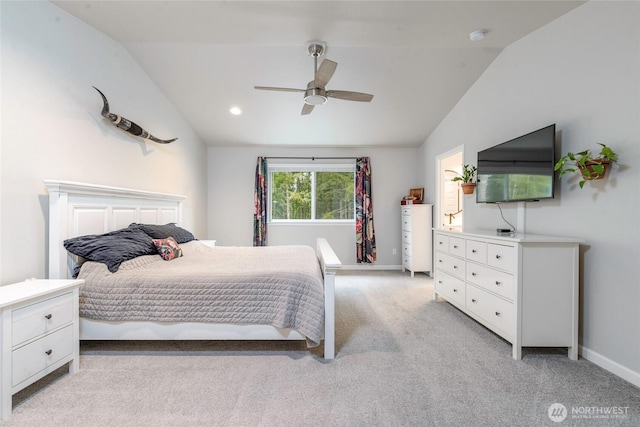 bedroom with light carpet, lofted ceiling, and ceiling fan