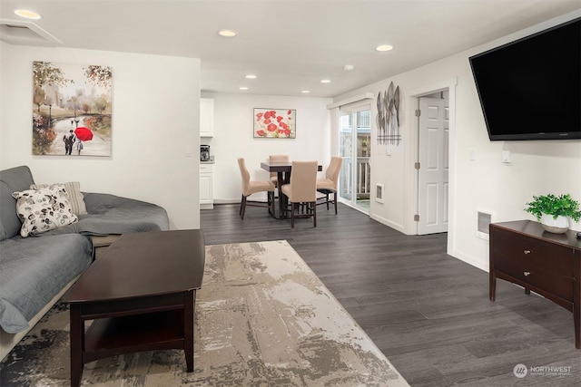 living room featuring dark hardwood / wood-style floors