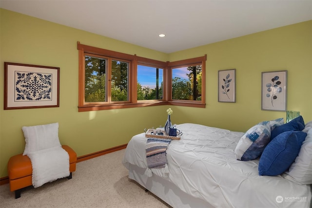 bedroom with light carpet