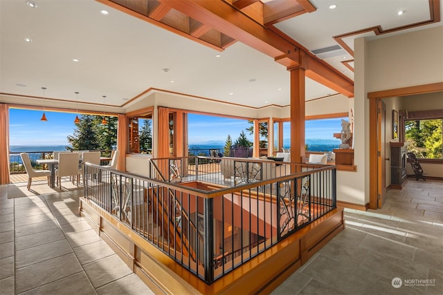 wooden deck with a water view