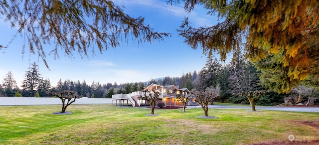 view of yard featuring a wooden deck