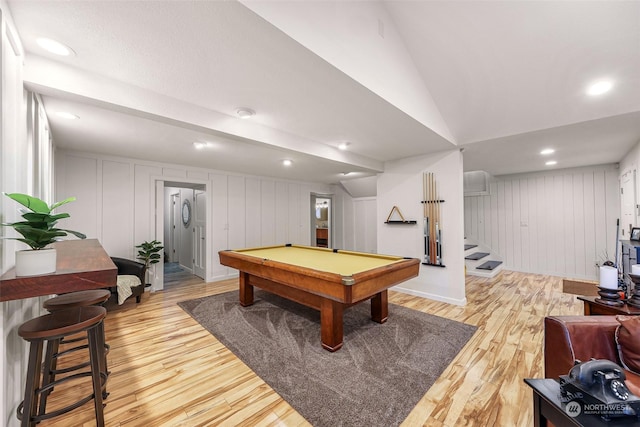 recreation room with vaulted ceiling, billiards, and light wood-type flooring