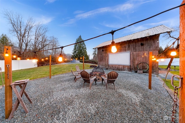 view of patio with an outdoor fire pit