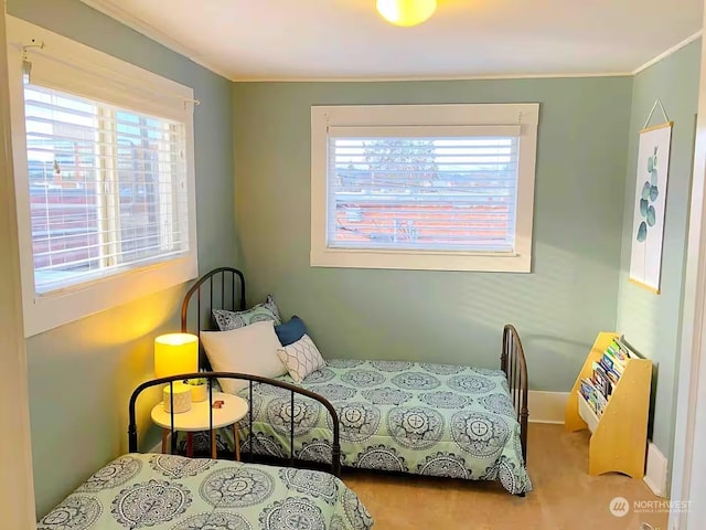 bedroom featuring crown molding