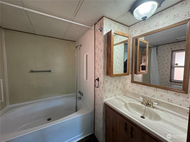 bathroom featuring shower / tub combination and vanity